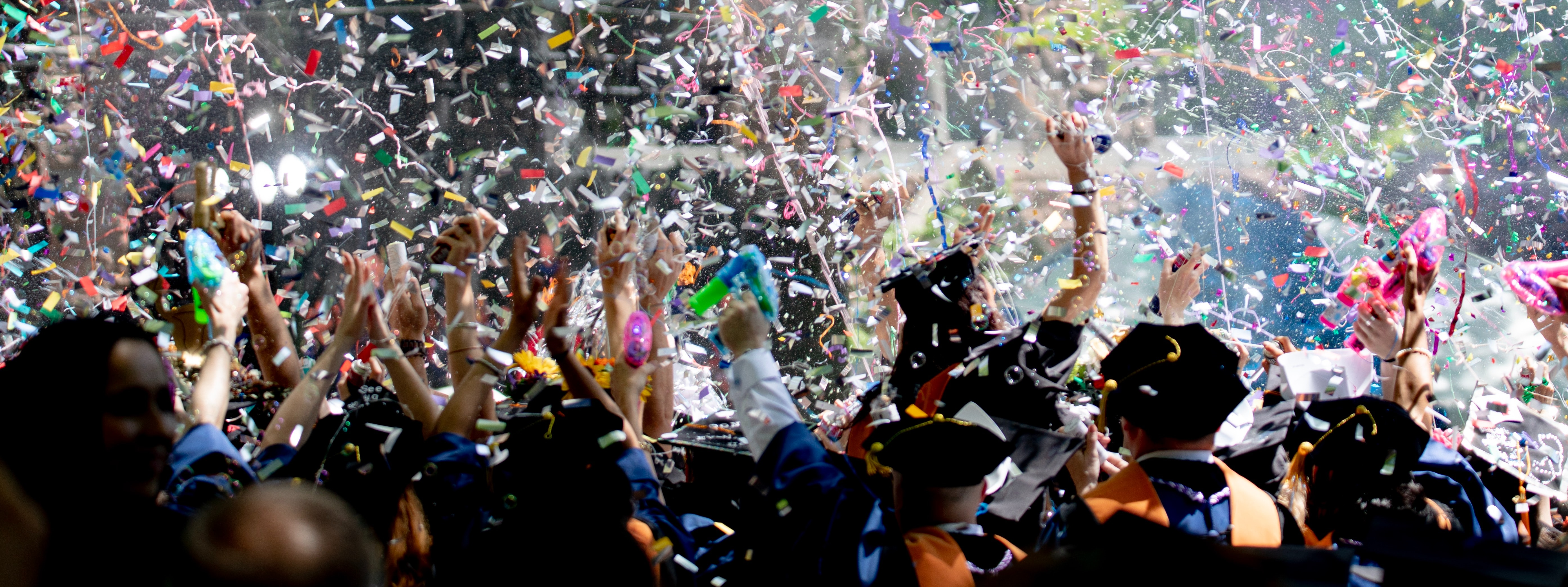 Credit and Cents image of Students celebrating in Best Student Credit Card article